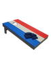 Corn hole board with red, white, and blue design and blue bean bags on top