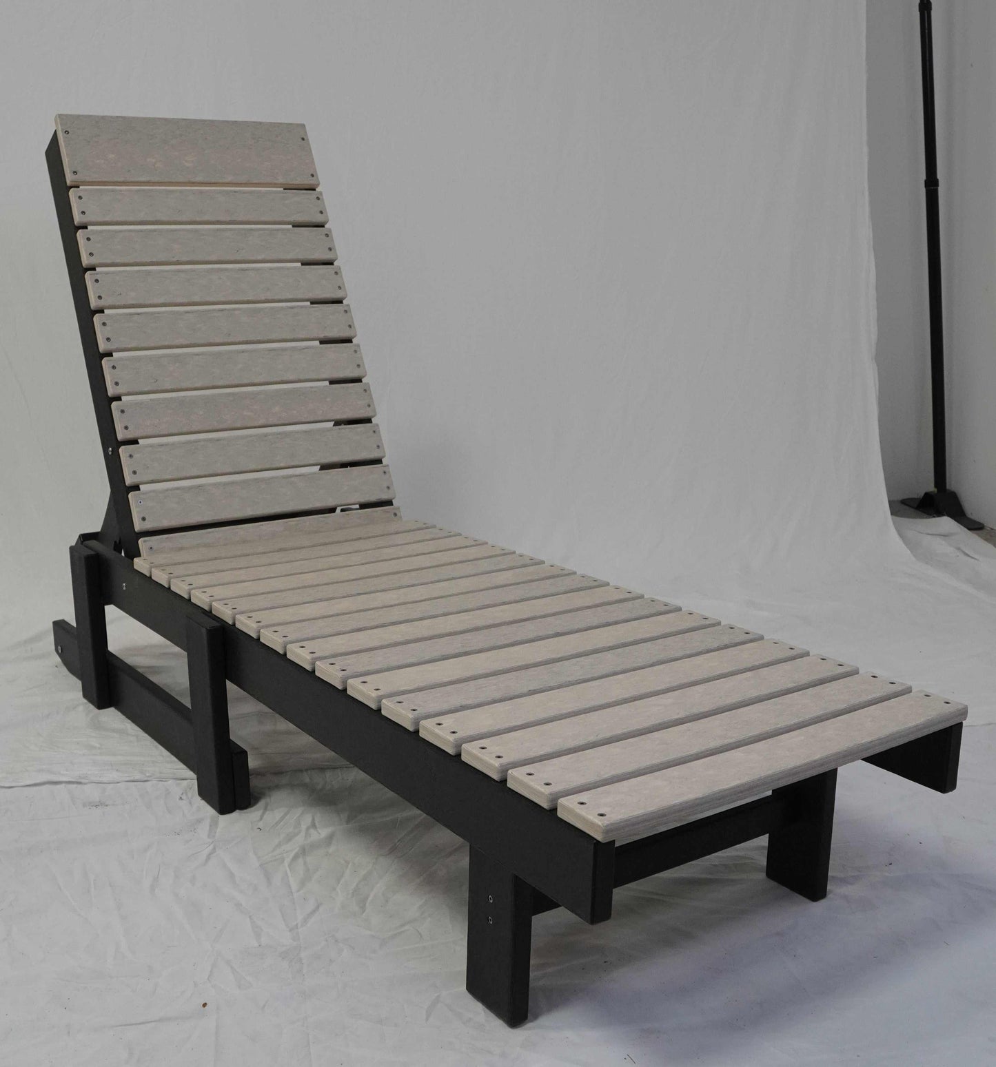 Minimalist outdoor straight chaise lounge with adjustable backrest and durable slatted design